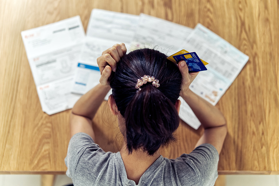 Young woman in financial stress