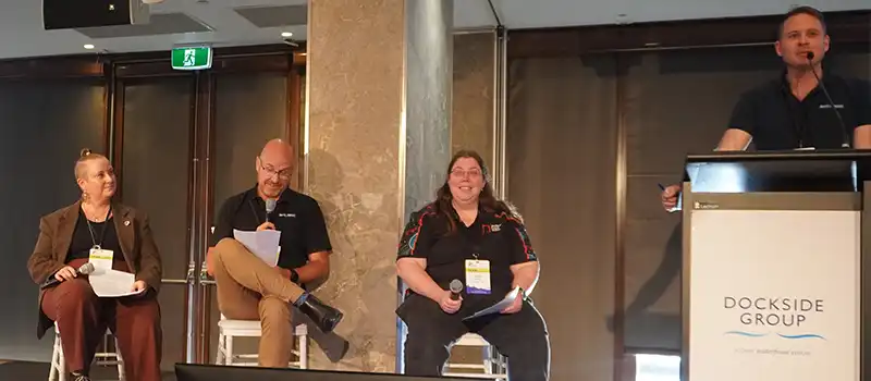 Erin Mulally (far left) participating in a panel at the 2026 FCAN Conference